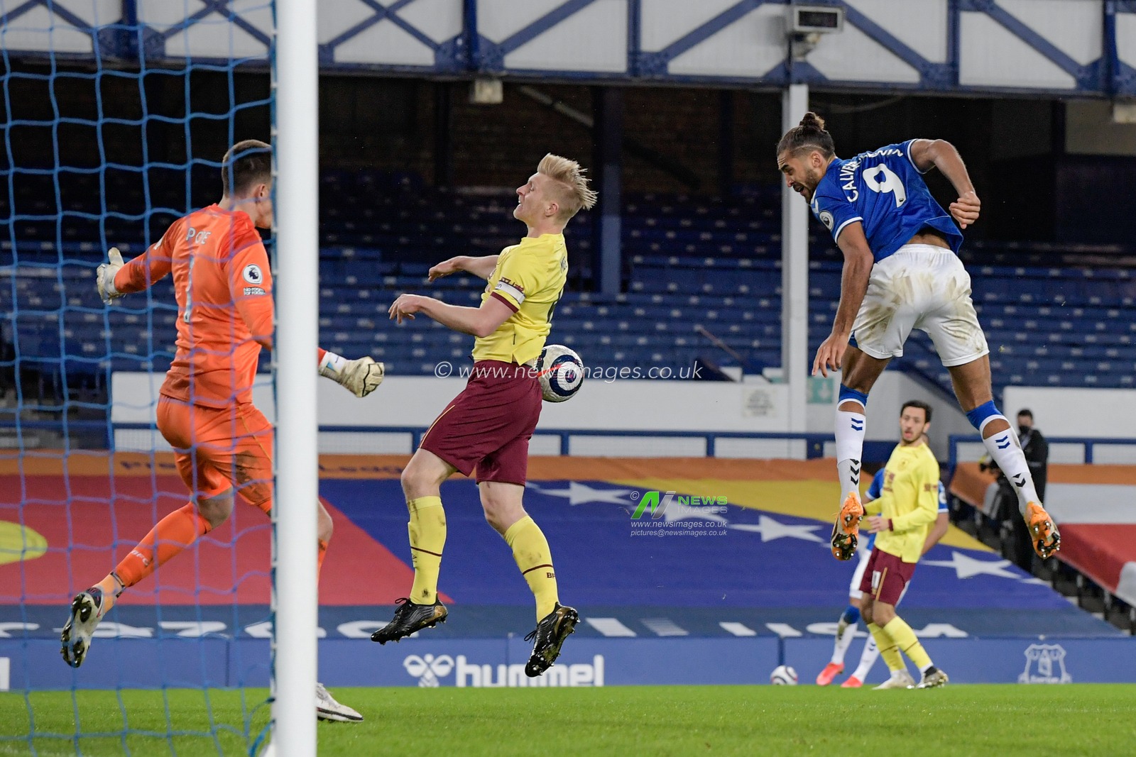 Dominic Calvert-Lewin #9 of Everton heads the ball towards the goal