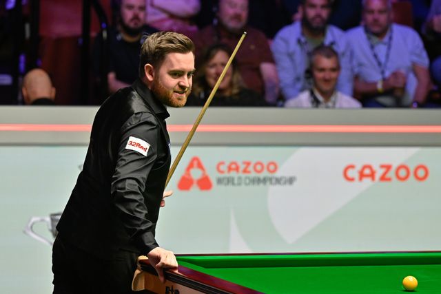 Jak Jones reacts while he looks over the table, during the Cazoo World Championships 2024 Final at Crucible Theatre, Sheffield, United Kingdom, 5th May 2024

(Photo by Cody Froggatt/News Images)