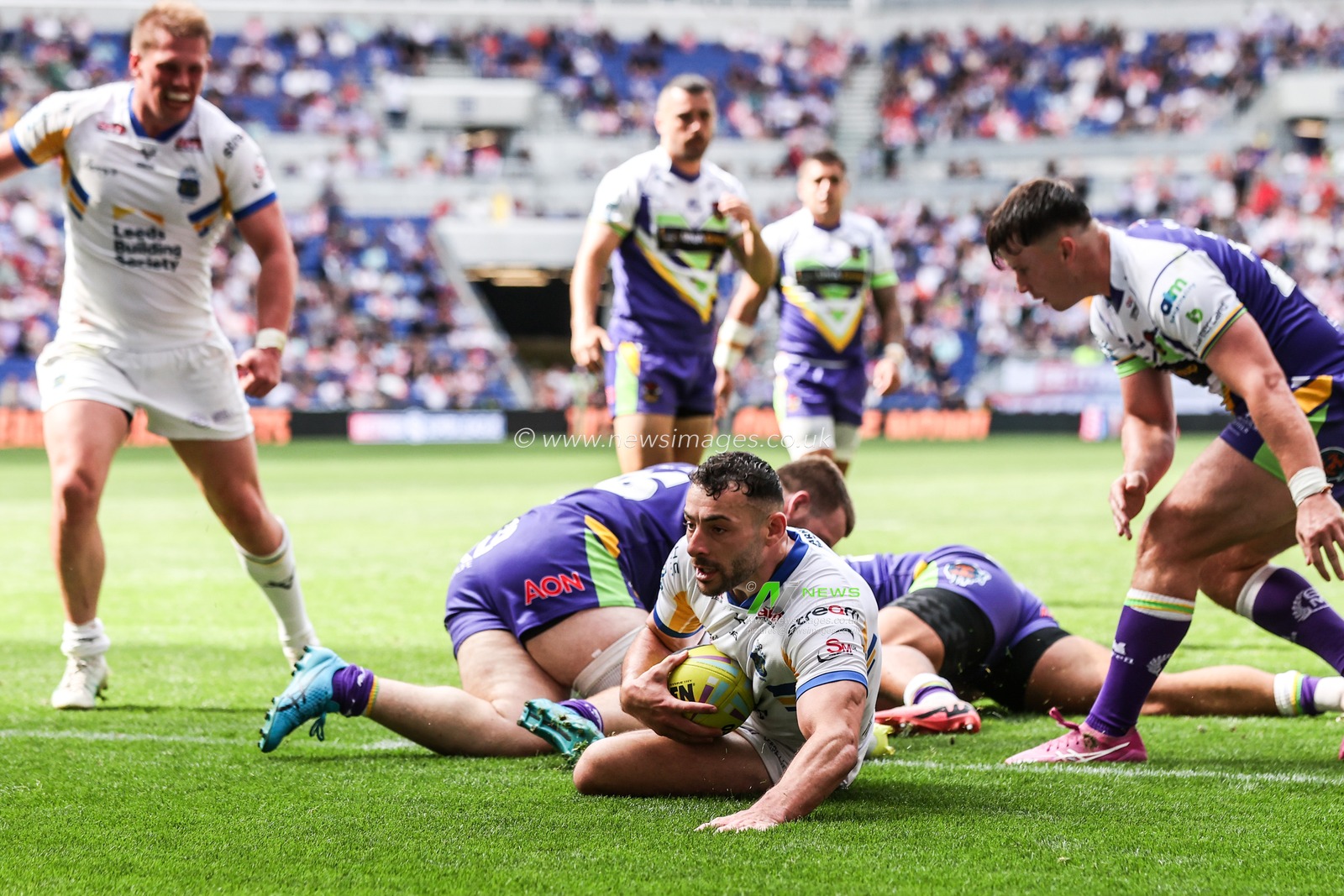 Jake Connor of Leeds Rhinos goes over for a try during the Betfred Super League Magic Weekend match Leeds Rhinos vs Bradford Bulls at Hill Dickinson Stadium, Liverpool, United Kingdom on 05 July 2026

(Photo by Alfie Cosgrove/News Images)