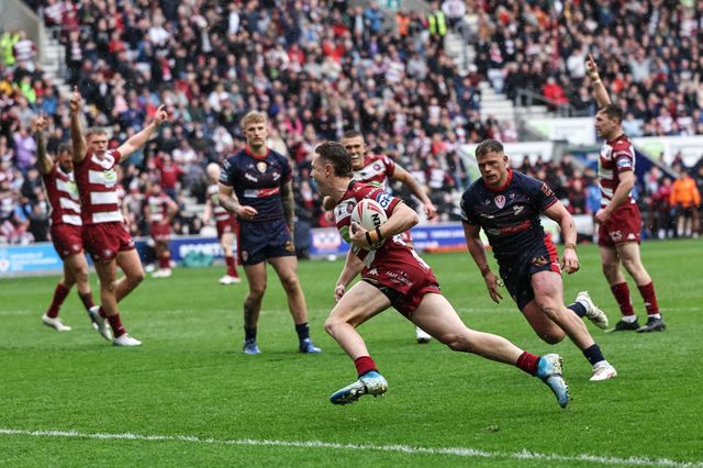 Jai Field of Wigan Warriors goes over for a try during the Betfred Super League Round 8 match Wigan Warriors vs St Helens at The Brick Community Stadium, Wigan, United Kingdom, 18th April 2025

(Photo by Mark Cosgrove/News Images)