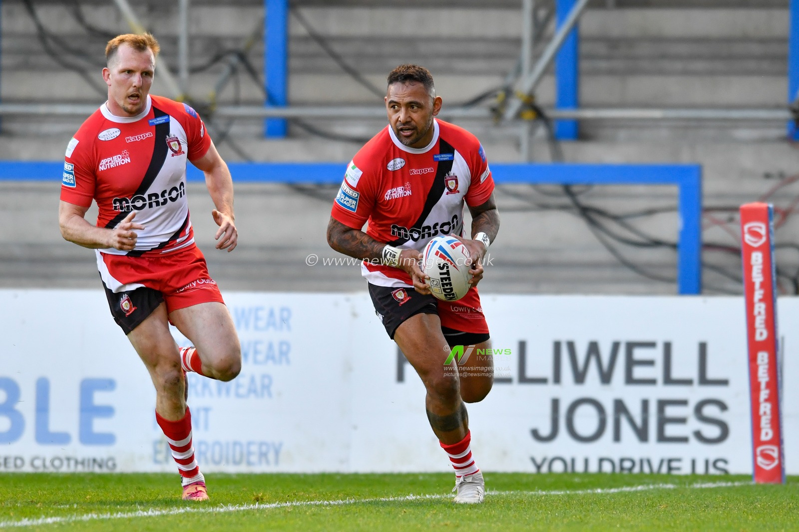 Krisnan Inu of Salford Red Devils goes over for a try to make it 6 - 4