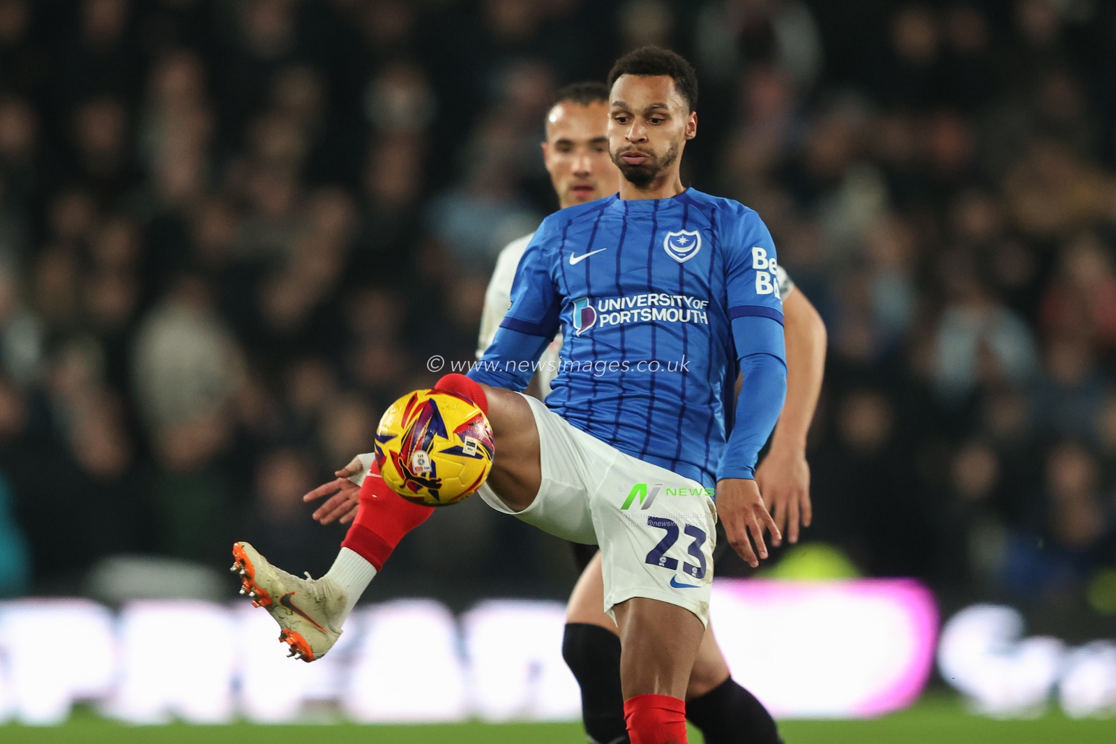 Josh Murphy of Portsmouth passes the ball during the Sky Bet Championship match Derby County vs Portsmouth at Pride Park Stadium, Derby, United Kingdom, 13th December 2024

(Photo by Alfie Cosgrove/News Images)