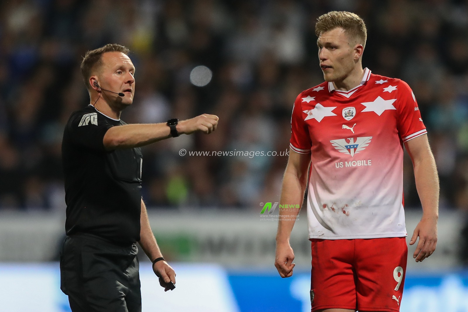 Sam Cosgrove of Barnsley speaks to referee Oliver Langford after he gives a decision for Bolton during the Sky Bet League 1 Play-offs Semi-final second leg match Bolton Wanderers vs Barnsley at Toughsheet Community Stadium, Bolton, United Kingdom, 7th May 2024

(Photo by Alfie Cosgrove/News Images)