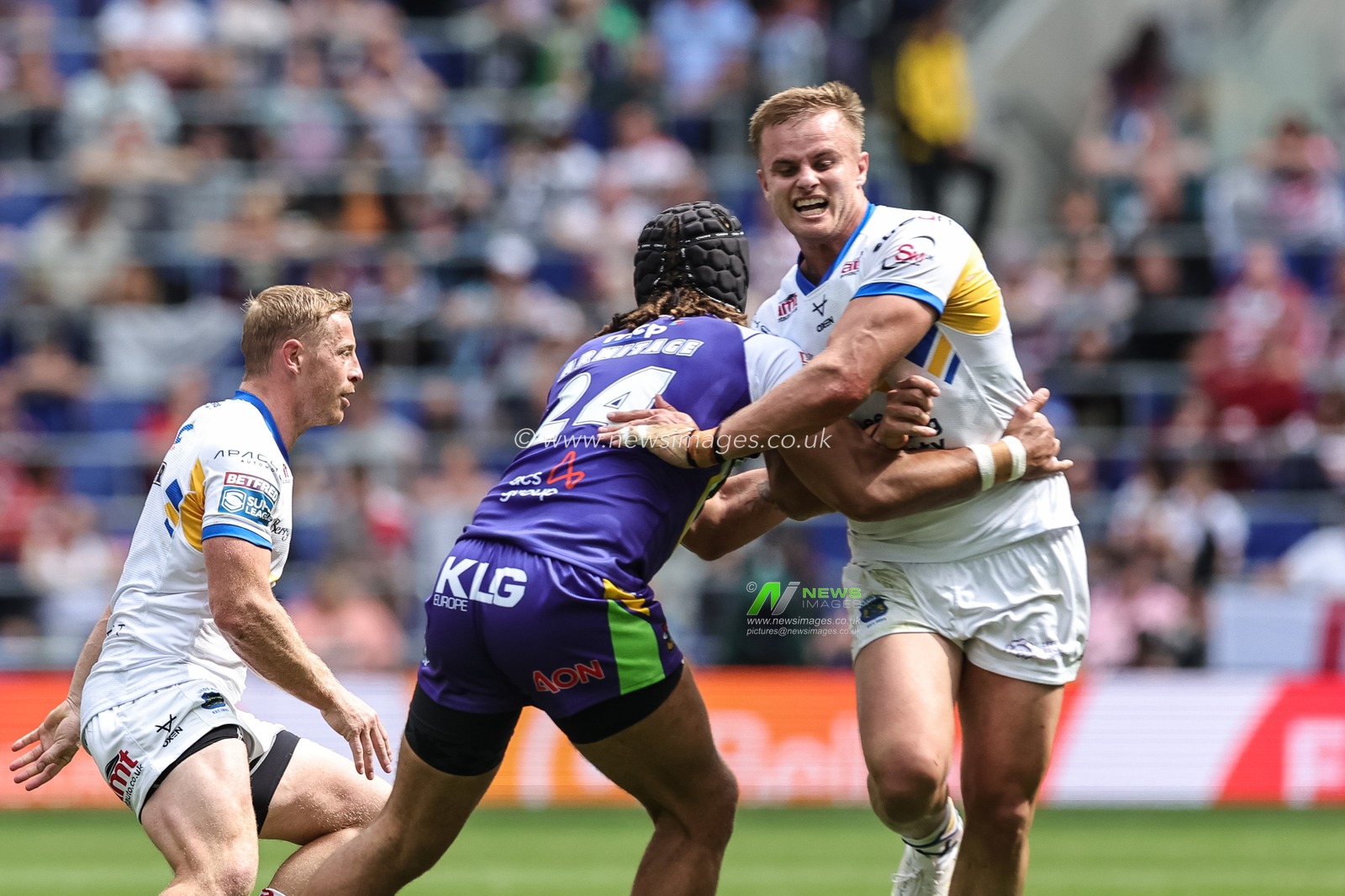 Cooper Jenkins of Leeds Rhinos is tackled by Guy Armitage of Bradford Bulls during the Betfred Super League Magic Weekend match Leeds Rhinos vs Bradford Bulls at Hill Dickinson Stadium, Liverpool, United Kingdom on 05 July 2026

(Photo by Mark Cosgrove/News Images)