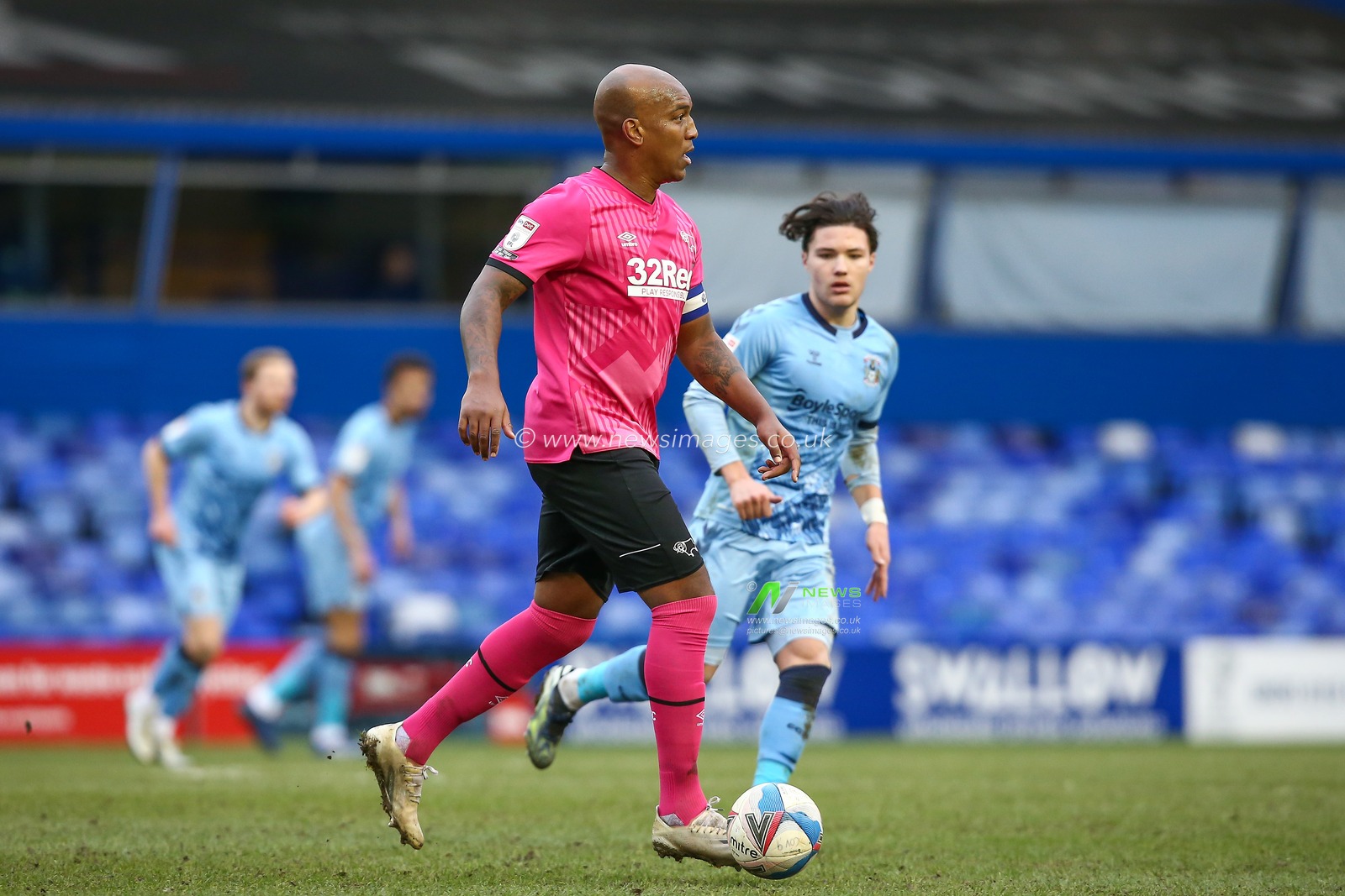 Andre Wisdom #2 of Derby County dribbles the ball
