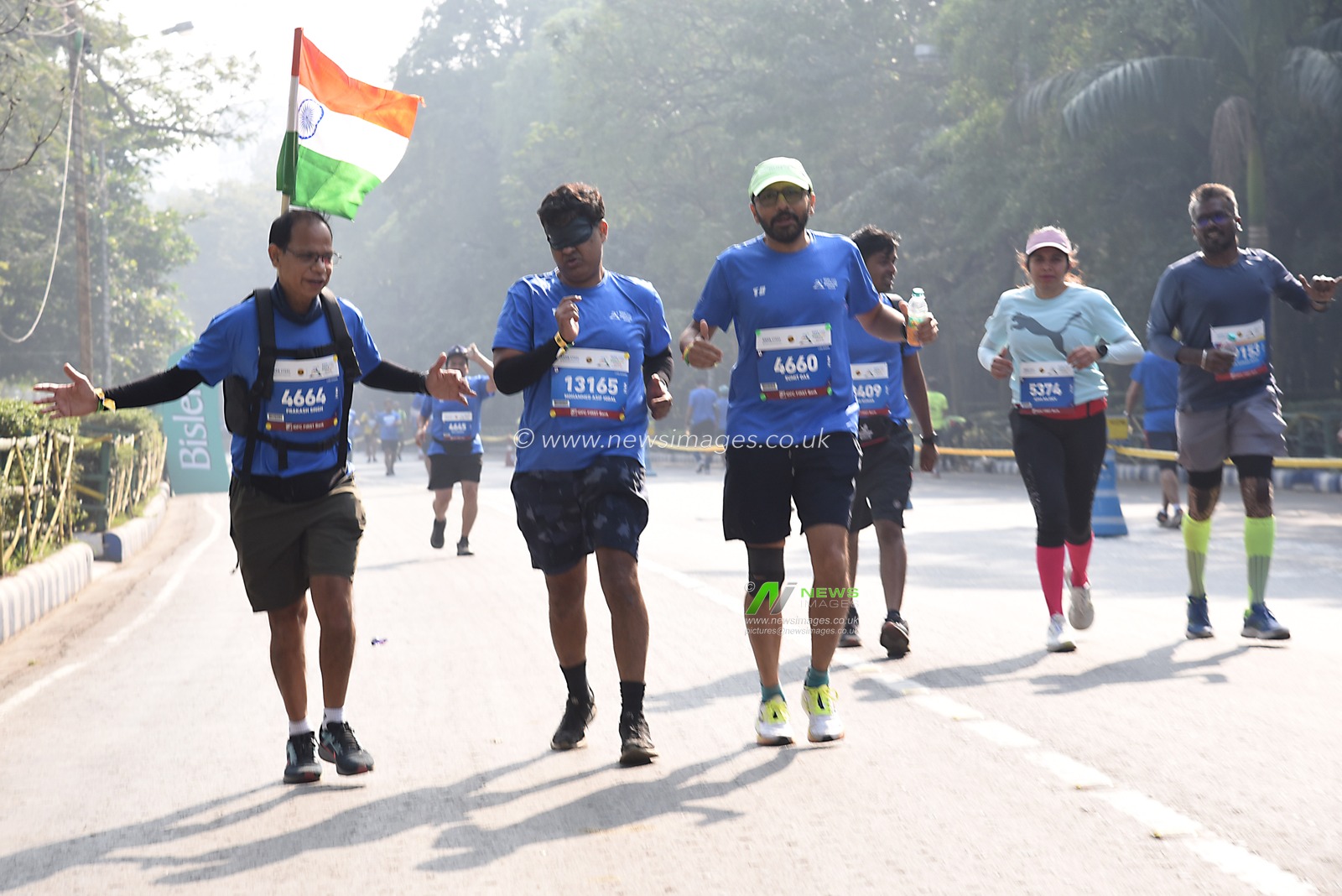 An Indian Armatures blind runner takes part in the "Tata Steel World 25K " and past Kolkata iconic Victoria Memorial  on 15 December,2024.Pictures by Debajyoti Chakraborty(Photo: Debajyoti Chakraborty/News Images)