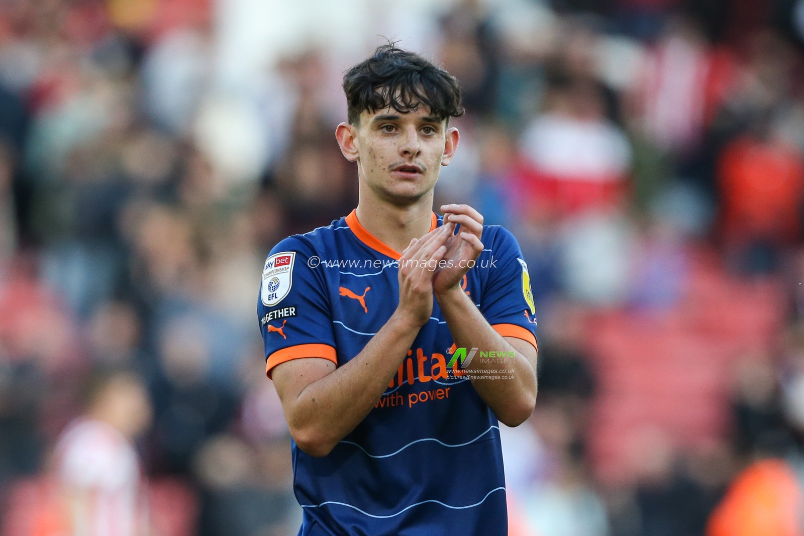 Charlie Patino #28 of Blackpool acknowledges the fans at the final whistle during the Sky Bet Championship match Sheffield United vs Blackpool at Bramall Lane, Sheffield, United Kingdom, 15th October 2022

(Photo by Arron Gent/News Images)