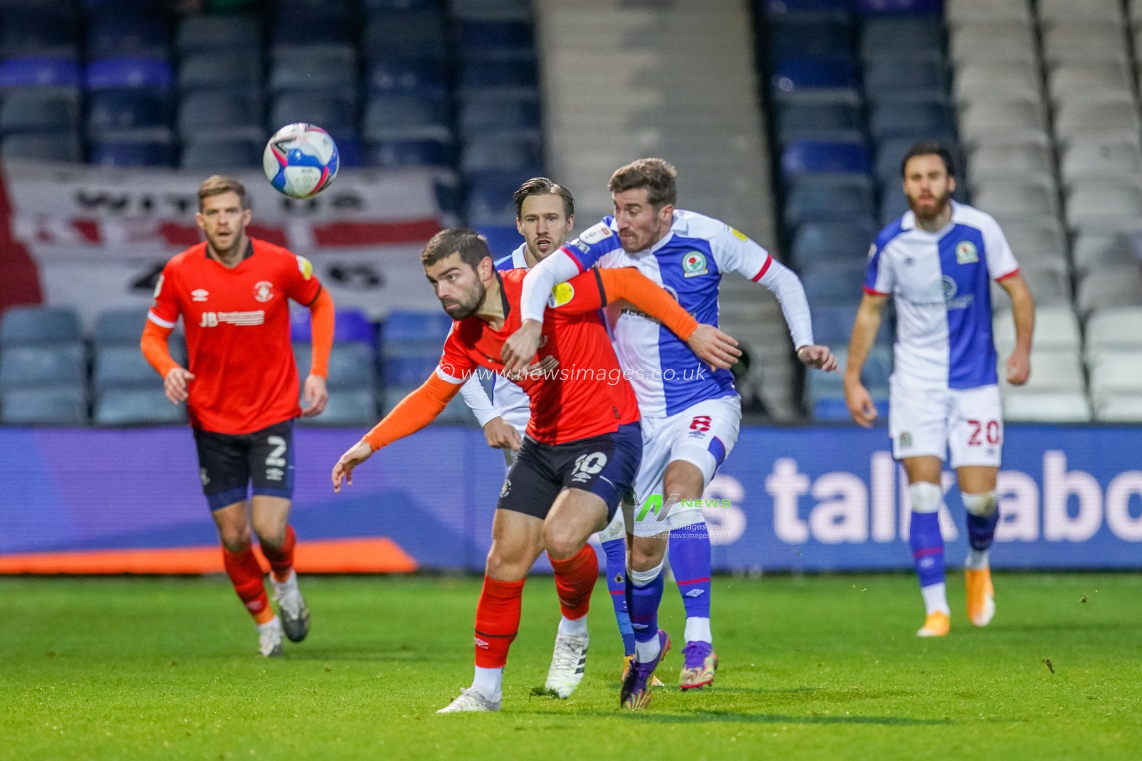 Elliot Lee #10 of Luton Town battles Joe Rothwell #8 of Blackburn Rovers