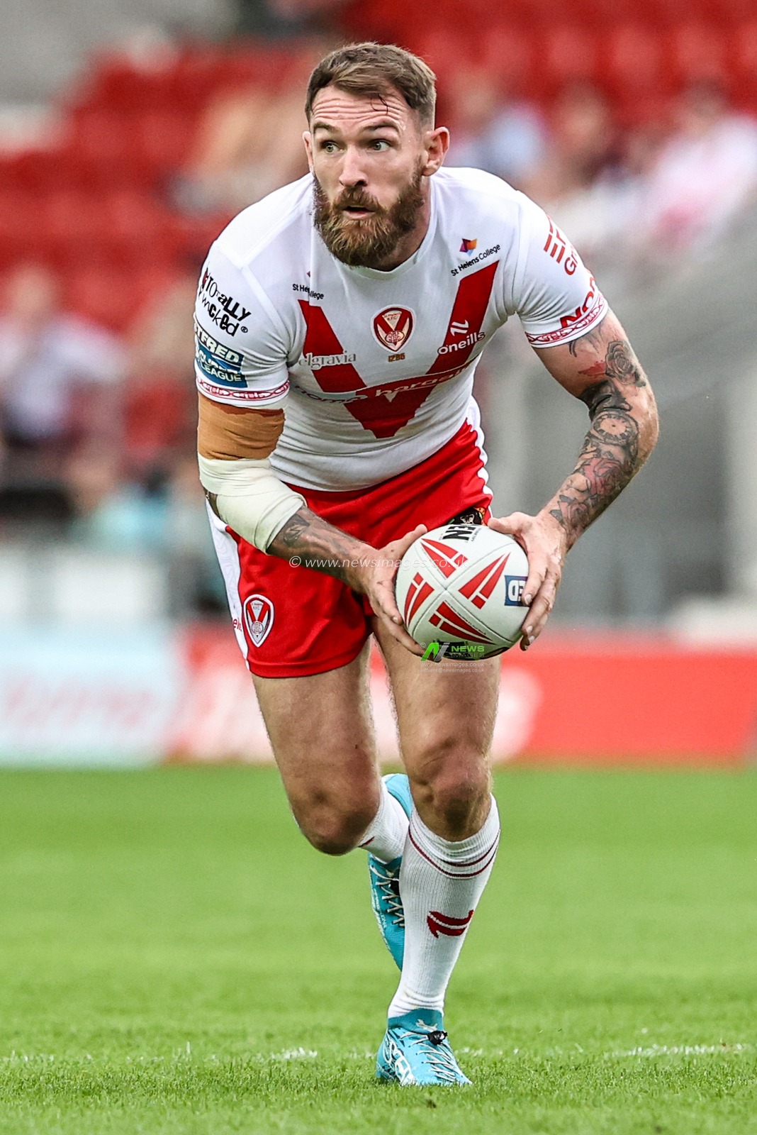Daryl Clark of St. Helens breaks with the ball during the Betfred Super League round 16 match St Helens vs Salford Red Devils at Totally Wicked Stadium, St Helens, United Kingdom, 29th June 2025

(Photo by Alfie Cosgrove/News Images)