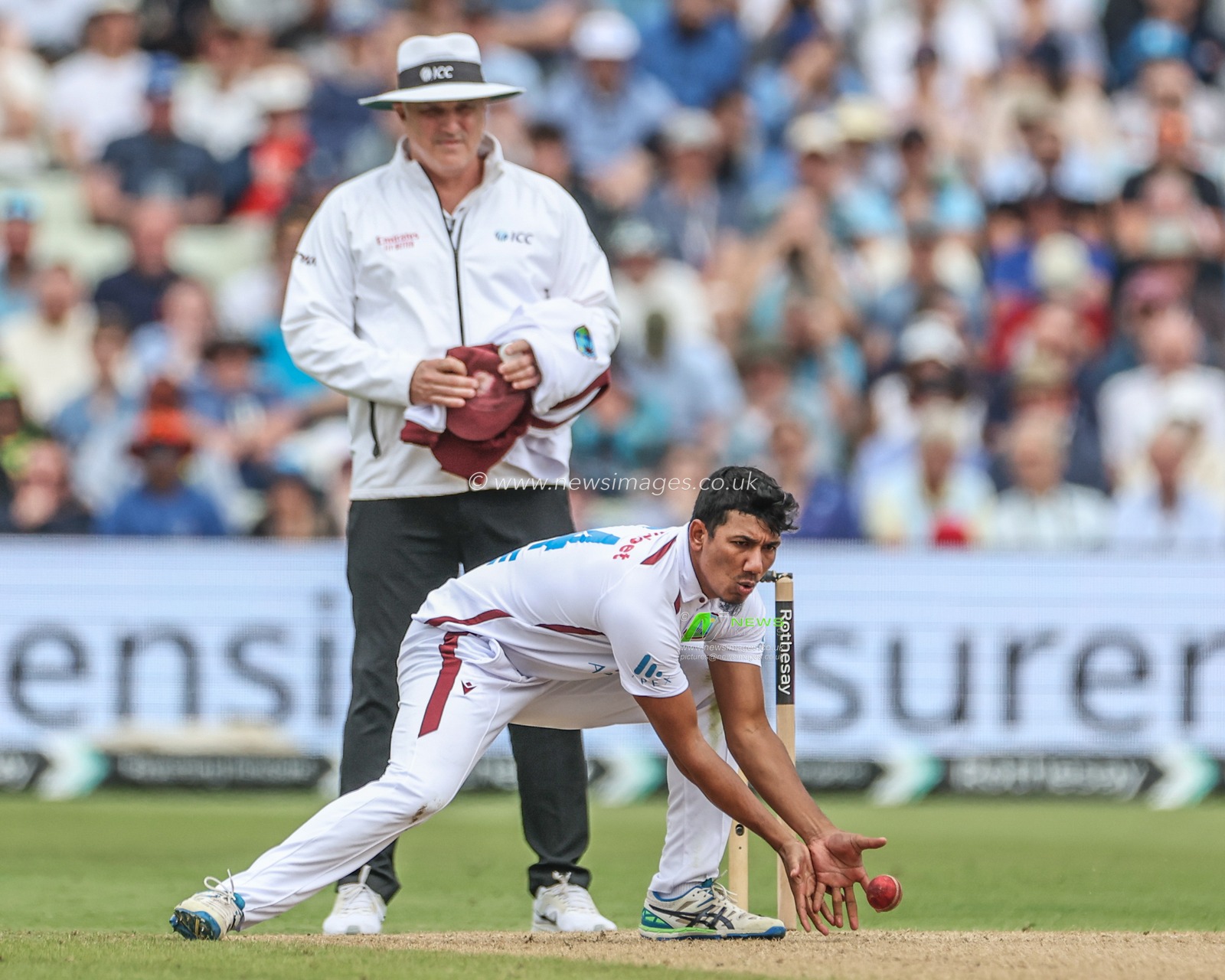 Gudakesh Motie of West Indies fields his own ball during Day Two of the Rothesay Test match England vs West Indies at Edgbaston, Birmingham, United Kingdom, 27th July 2024

(Photo by Mark Cosgrove/News Images)