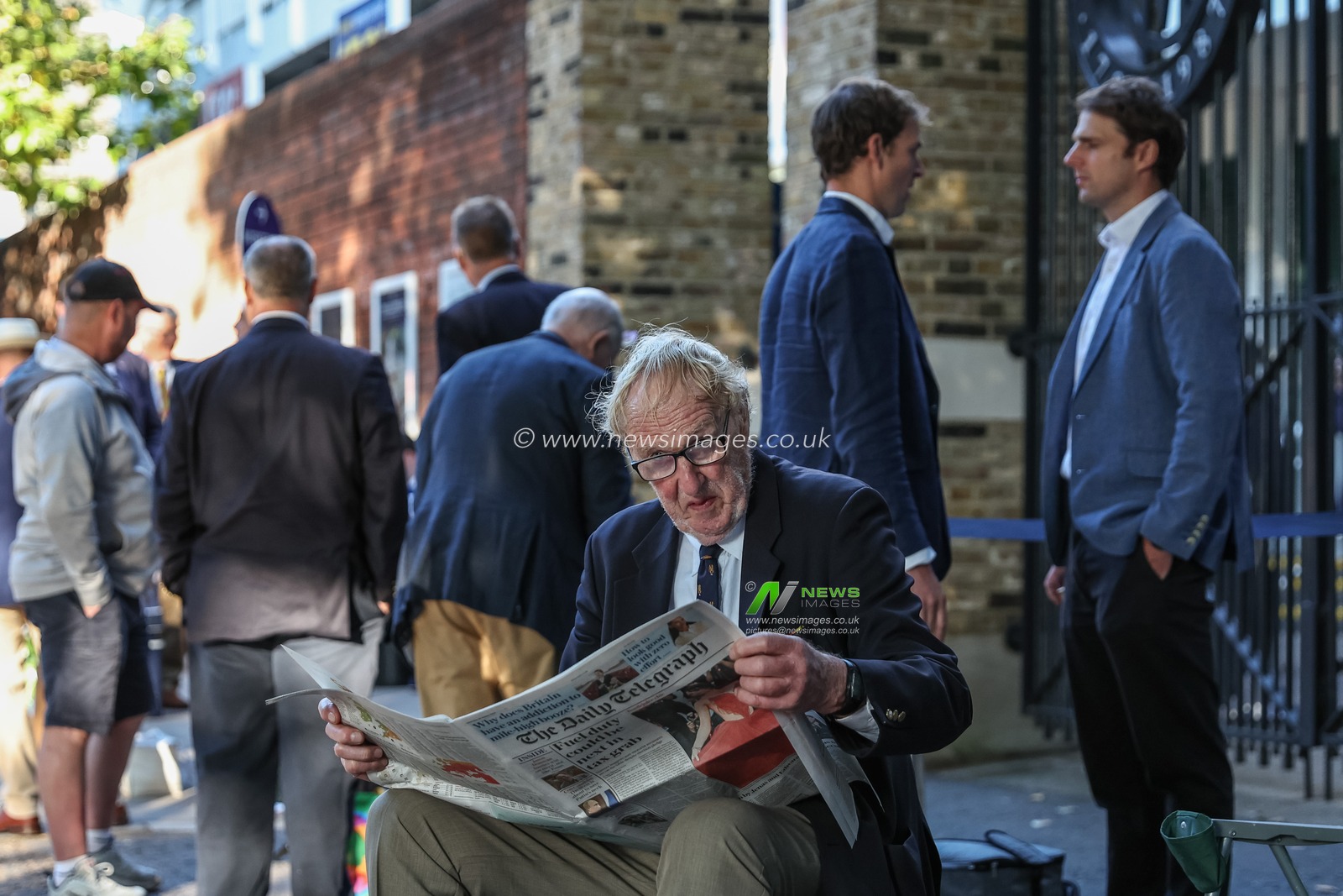 A Marylebone Cricket Club member reads the Daily Telegraph as he waits for the gates to open during the England v Sri Lanka 2nd Rothesay Test Match Day 1 at Lords, London, United Kingdom, 29th August 2024

(Photo by Mark Cosgrove/News Images)