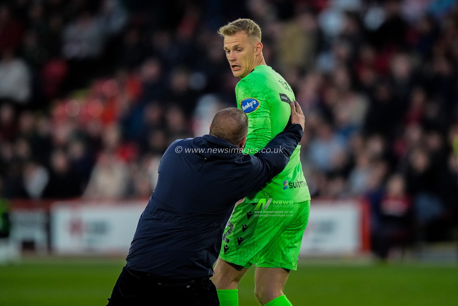 Blackburn Rovers goalkeeper Balazs Toth reacts after a fan invades the pitch to celebrate Yuki Ohashi of Blackburn Rovers scoring a goal to make it 0-2  during the Sky Bet Championship match Sheffield United vs Blackburn Rovers at Bramall Lane, Sheffield, United Kingdom on 22 April 2026

(Photo by Maynard Manyowa/News Images)