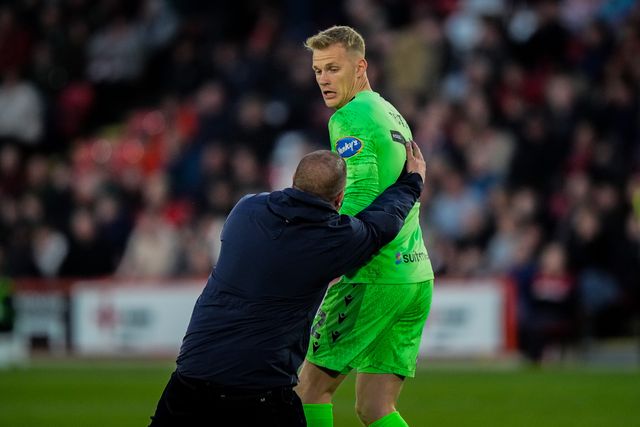Blackburn Rovers goalkeeper Balazs Toth reacts after a fan invades the pitch to celebrate Yuki Ohashi of Blackburn Rovers scoring a goal to make it 0-2  during the Sky Bet Championship match Sheffield United vs Blackburn Rovers at Bramall Lane, Sheffield, United Kingdom on 22 April 2026

(Photo by Maynard Manyowa/News Images)