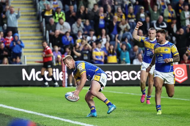 Lachie Miller of Leeds Rhinos goes over for a try during the Betfred Super League round 23 match Leeds Rhinos vs Hull KR at Headingley Stadium, Leeds, United Kingdom, 21st August 2025

(Photo by Mark Cosgrove/News Images)