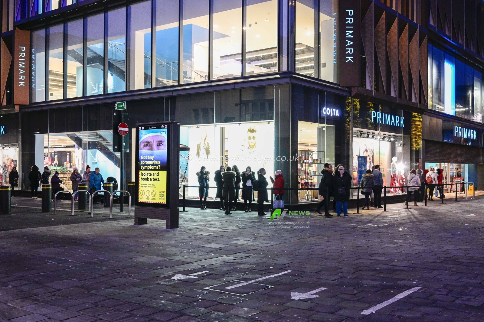 Queues form around Primark on Northumberland Street in Newcastle upon Tyne as the store reopens after the end of the country's second national lockdown