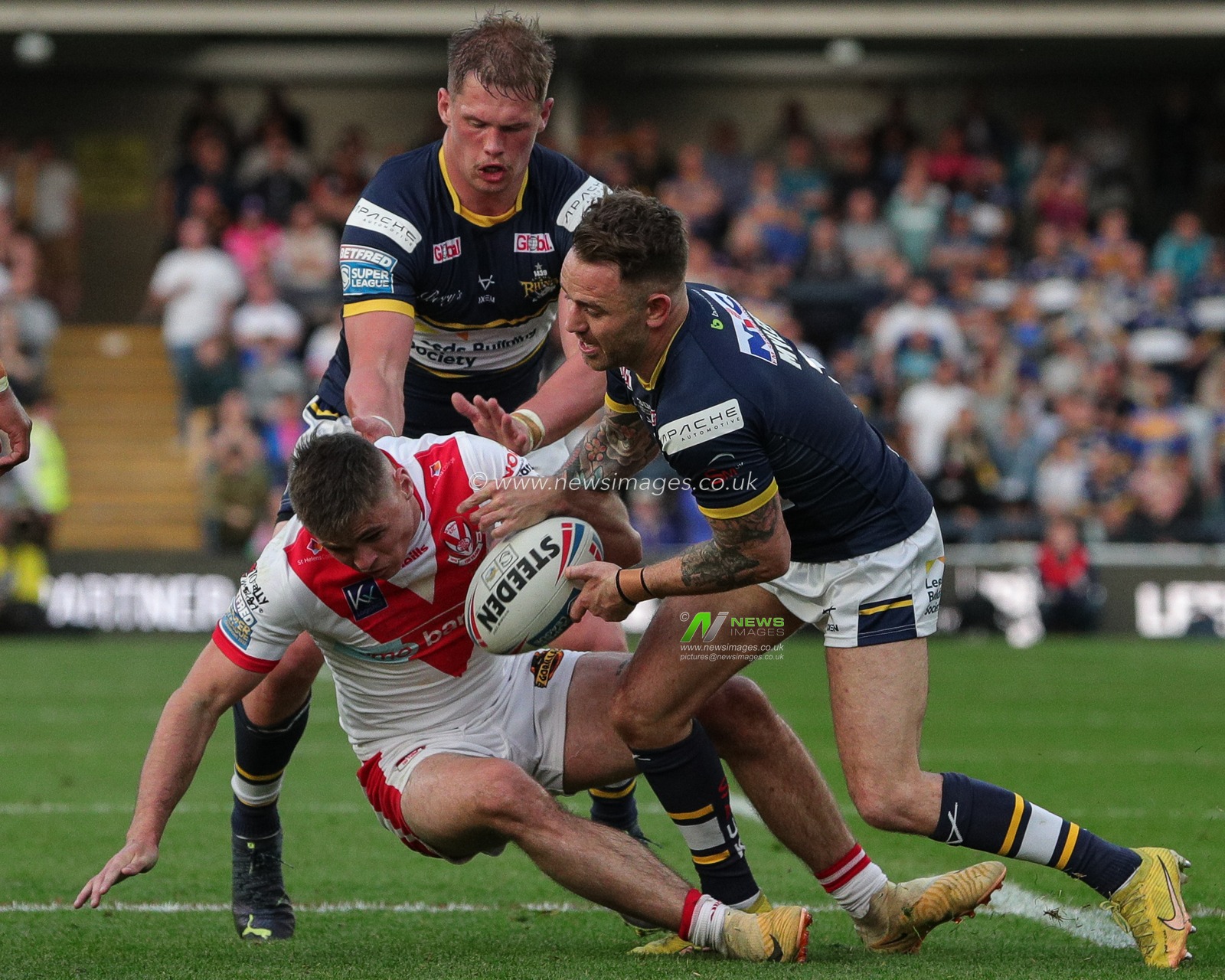 Jack Welsby #1 of St Helens loses the ball as Richie Myler #1 of Leeds Rhinos tackles him during the Betfred Super League Round 13 match Leeds Rhinos vs St Helens at Headingley Stadium, Leeds, United Kingdom, 26th May 2023

(Photo by James Heaton/News Images)