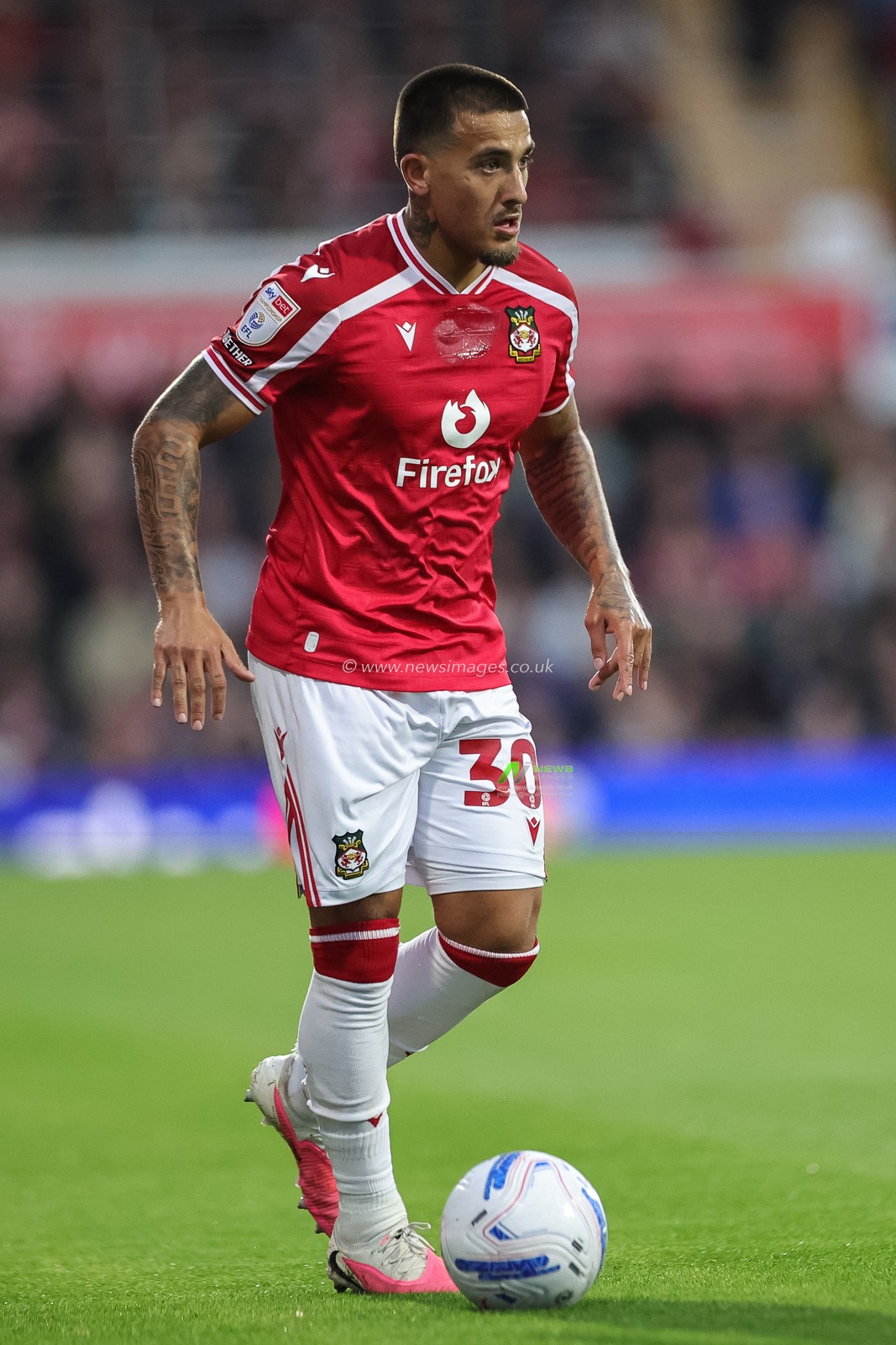 Danny Imray of Wrexham with the ball during the Sky Bet Championship match Wrexham vs Birmingham City at The Racecourse Ground, Wrexham, United Kingdom on 28 August 2026

(Photo by Mark Cosgrove/News Images)