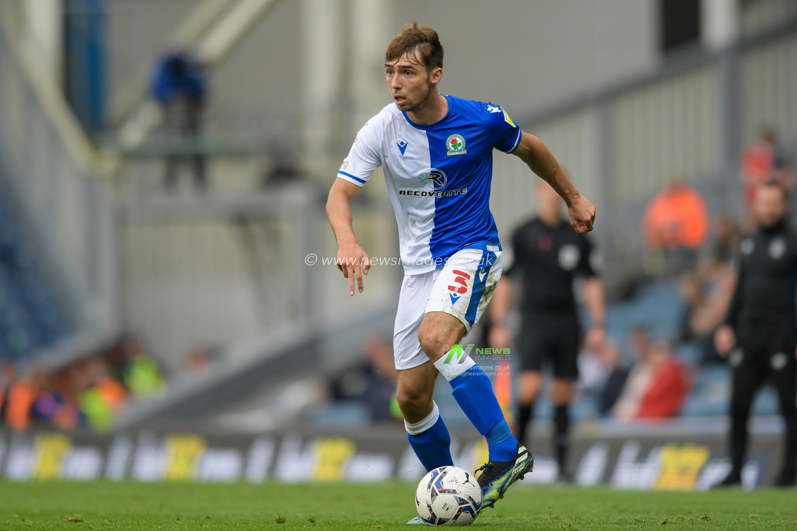 Harry Pickering #3 of Blackburn Rovers runs with the ball