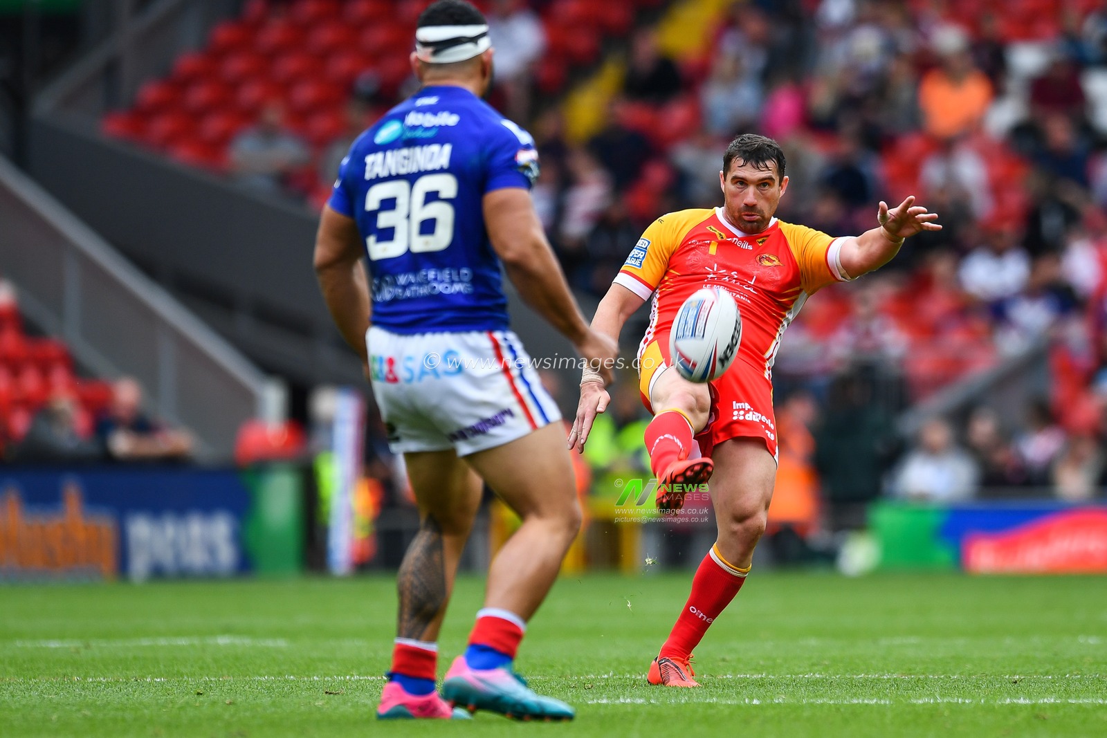 25th May 2019 , Anfield Stadium, Liverpool, England; Dacia Magic Weekend, Betfred Super League Round 16, Wakefield Trinity vs Catalans Dragons ; Matty Smith (7) of Catalans Dragons puts in a kick

Credit: Craig Thomas/News Images