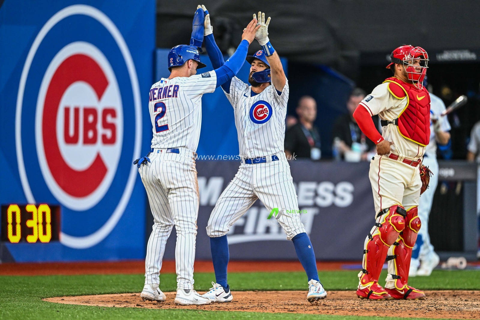 Dansby Swanson #7 of the Chicago Cubs celebrates his home run with Nico Hoerner #2 during the 2023 MLB London Series match St. Louis Cardinals vs Chicago Cubs at London Stadium, London, United Kingdom, 24th June 2023

(Photo by Craig Thomas/News Images)