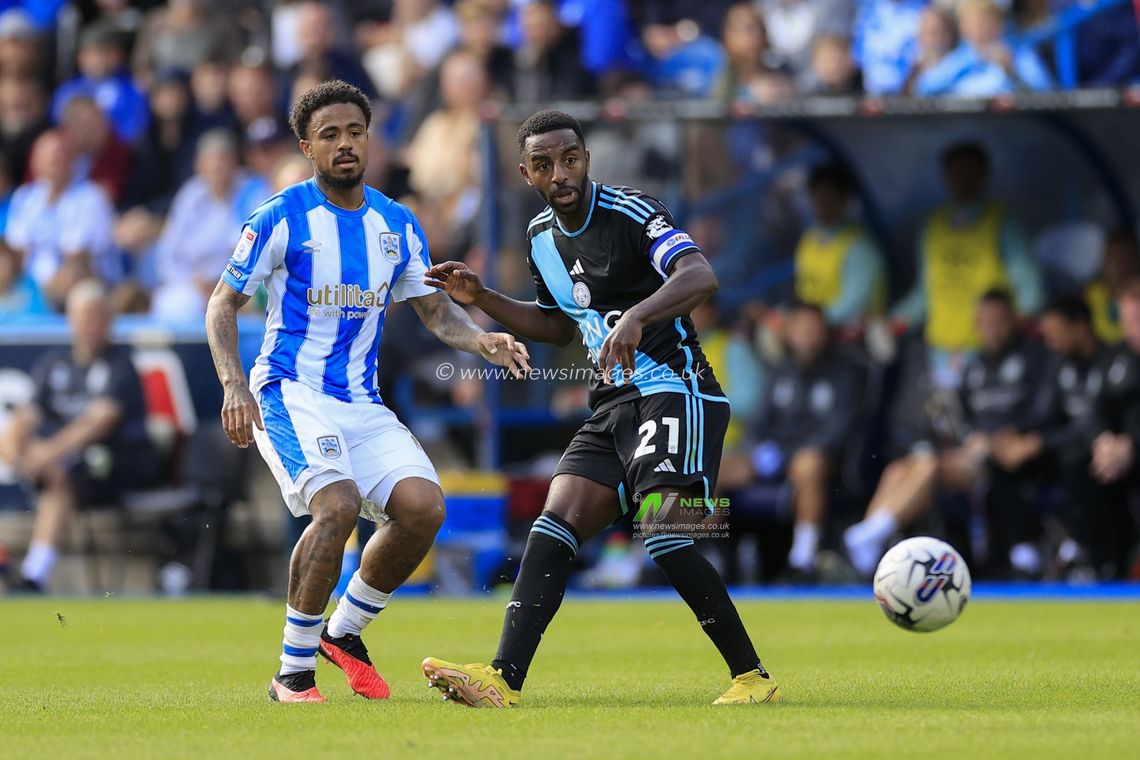 Ricardo Pereira #21 of Leicester City passes the ball under pressure from Josh Koroma #10 of Huddersfield Town during the Sky Bet Championship match Huddersfield Town vs Leicester City at John Smith's Stadium, Huddersfield, United Kingdom, 12th August 2023

(Photo by Conor Molloy/News Images)
