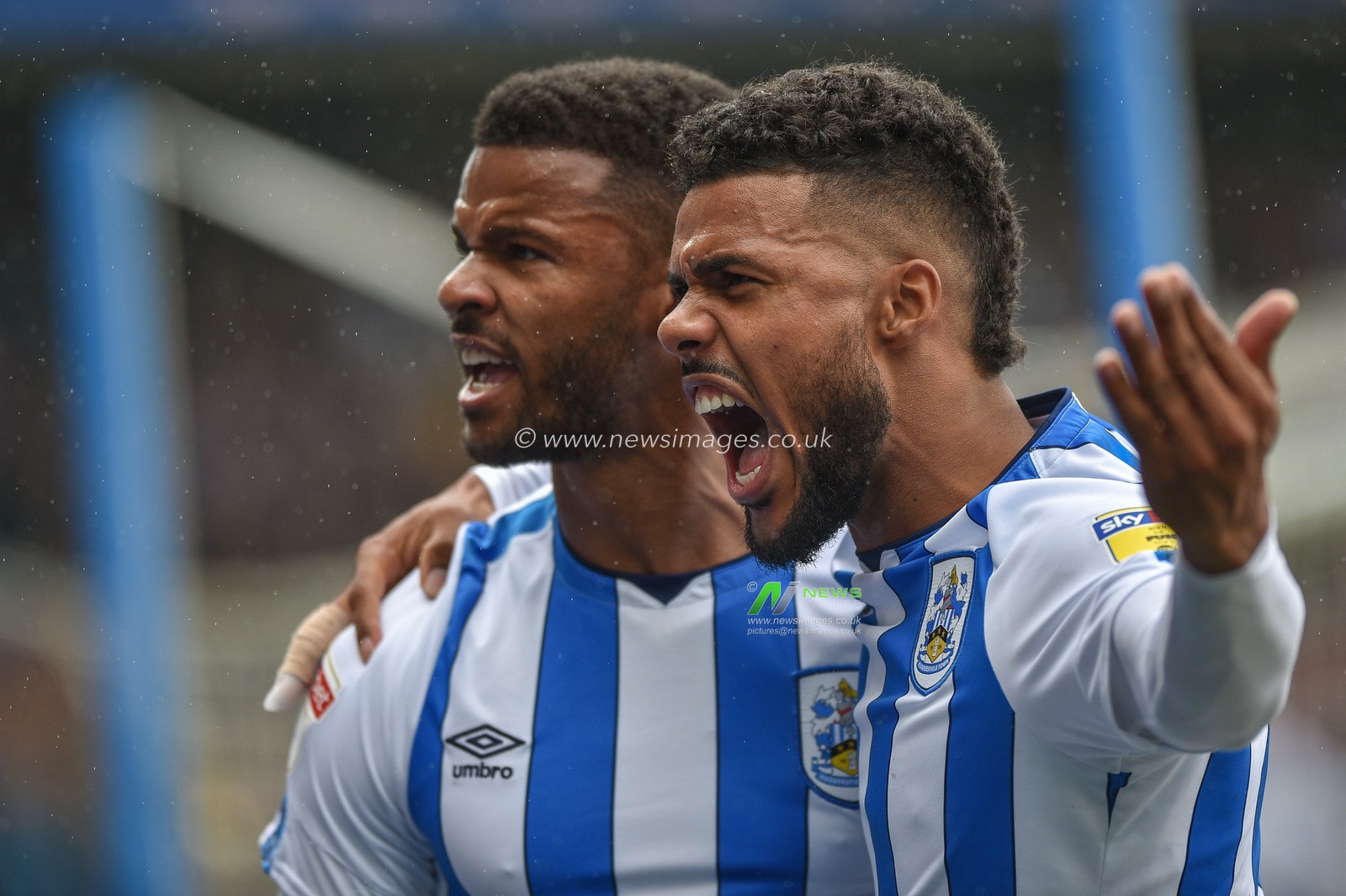 28th September 2019, John Smith's Stadium, Huddersfield, England; Sky Bet Championship, Huddersfield Town v Millwall :Elias Kachunga celebrates with Fraizer Cambell (22) of Huddersfield Town scores his first goal for his hometown club to take a 1-0 lead

Credit: Dean Williams/News Images