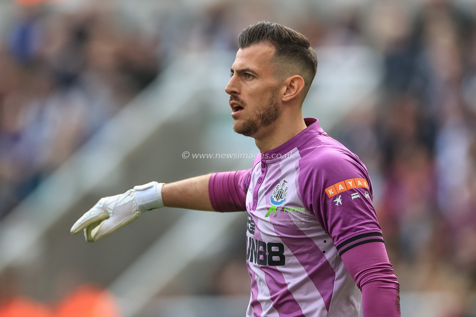 Martin Dubravka #1 of Newcastle United gives his team instructions