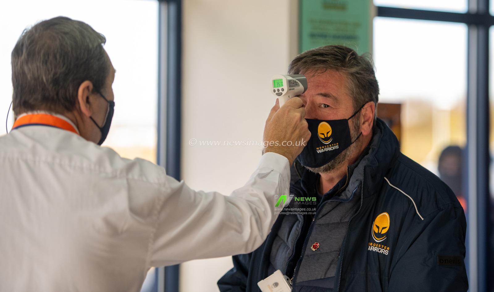 Supporters being temperature checked at Sixways on arrival.