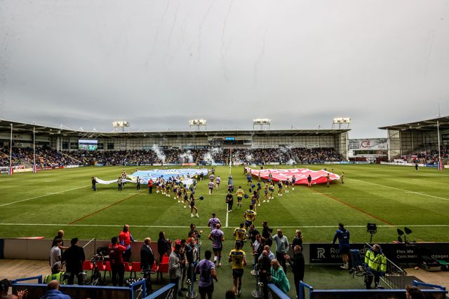 The teams come out for the game during the Betfred Super League Round 12 match Warrington Wolves vs Hull KR at Halliwell Jones Stadium, Warrington, United Kingdom, 23rd May 2025

(Photo by Alfie Cosgrove/News Images)