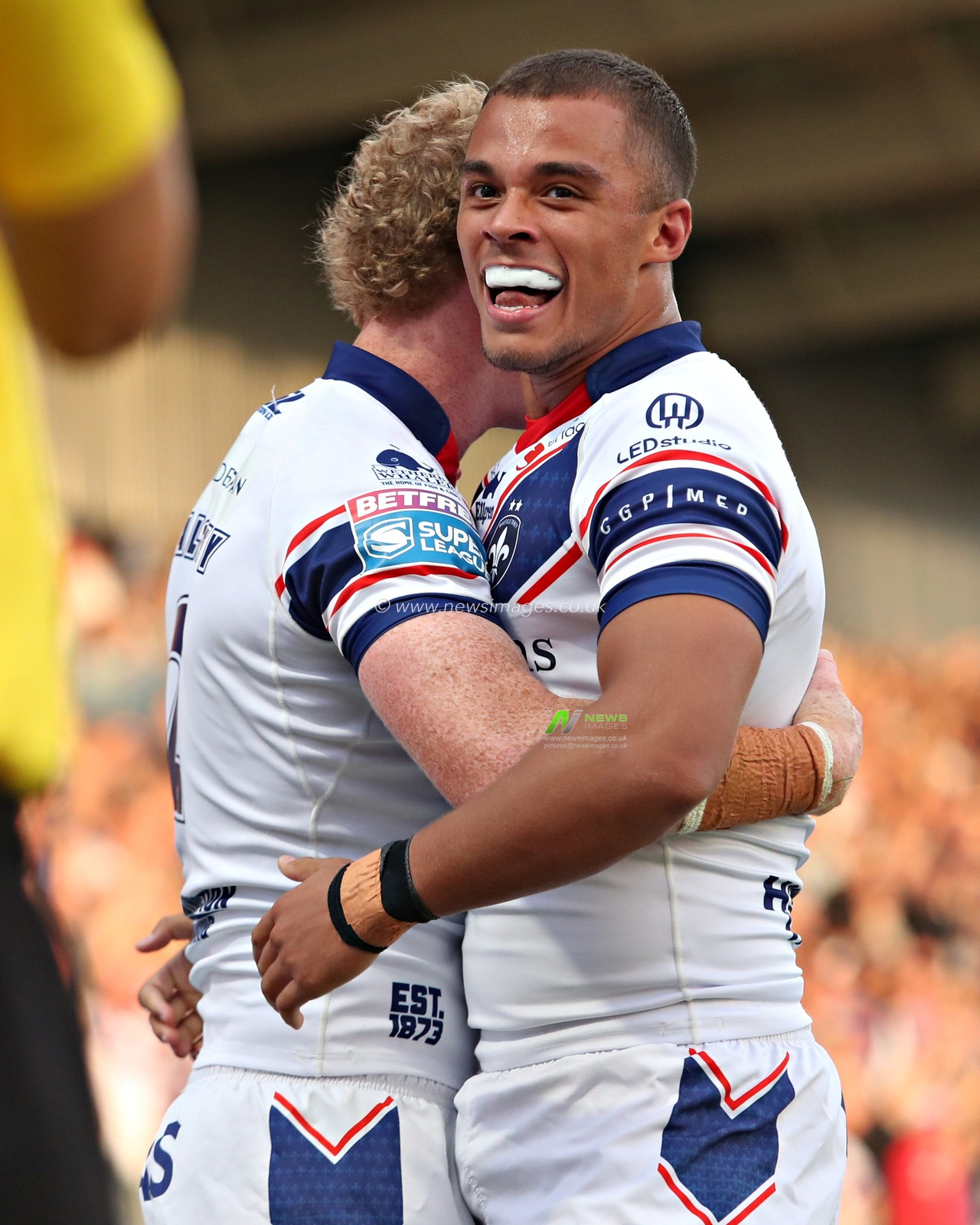 Lachlan Walmsley of Wakefield Trinity celebrates his try with Corey Hall of Wakefield Trinity during the Betfred Super League round 20 match Wakefield Trinity vs Leeds Rhinos at DIY Kitchens Stadium, Wakefield, United Kingdom, 24th July 2025(Photo by Sam Eaden/News Images)