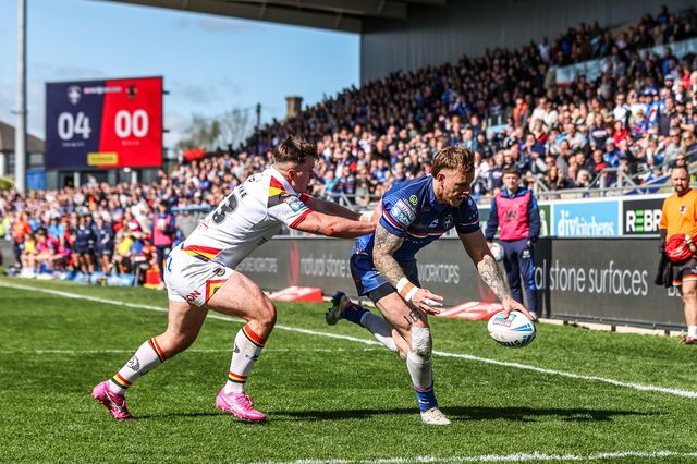 Tom Johnstone of Wakefield Trinity goes over for a try during the Betfred Super League round 8 match Wakefield Trinity vs Bradford Bulls at DIY Kitchens Stadium, Wakefield, United Kingdom on 18 April 2026

(Photo by Alfie Cosgrove/News Images)