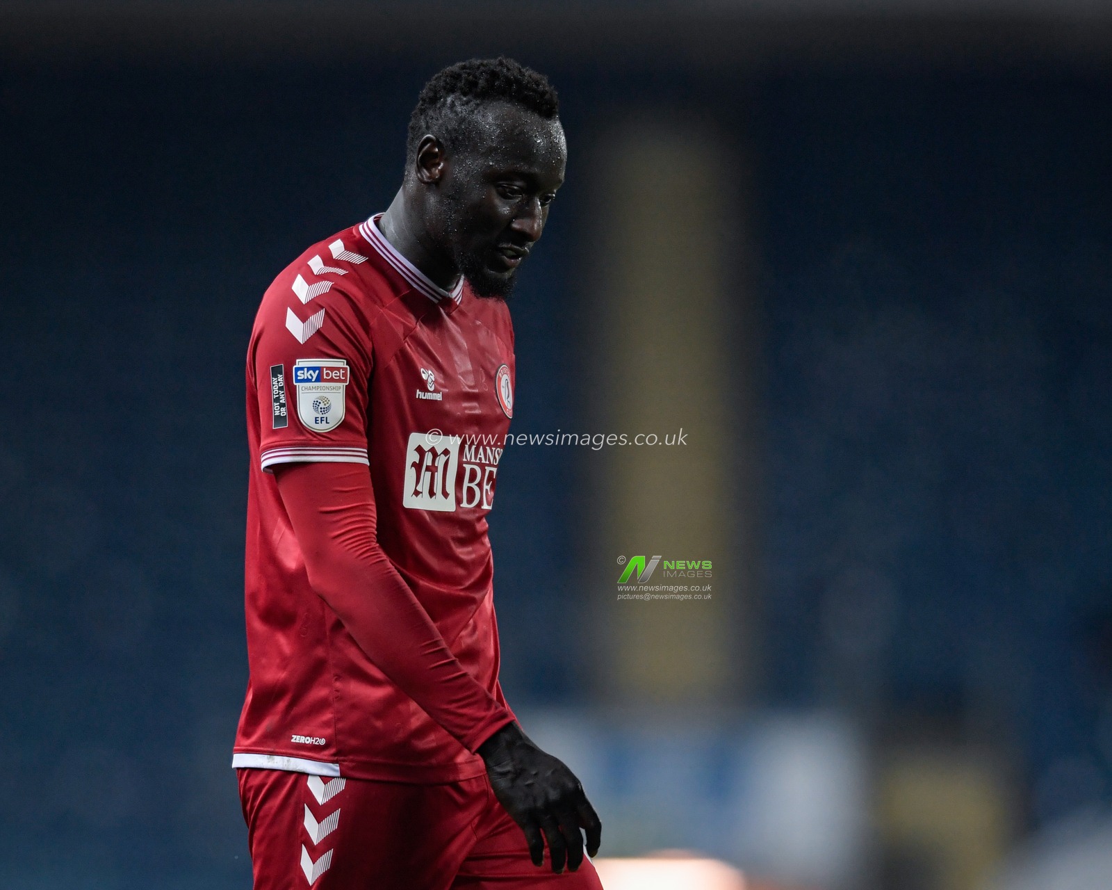 Famara Diedhiou #9 of Bristol City looks down at the ground