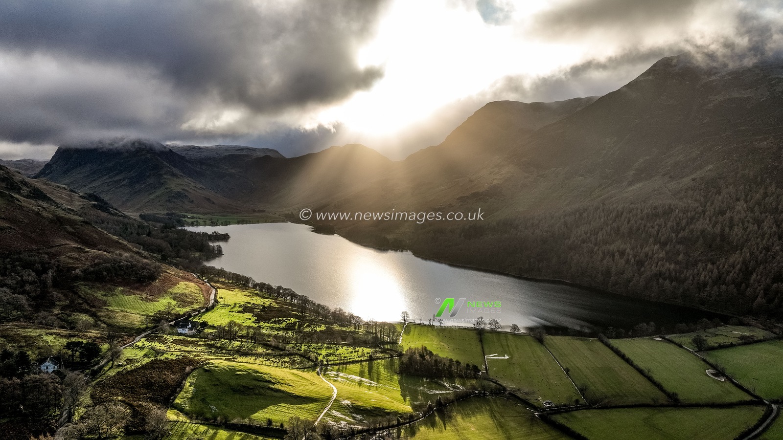 The sun shines through the clouds and over Buttermere reservoir during a cold winters morning at Buttermere, TheLake District, Cumbria, United Kingdom, 3rd January 2025

(Photo by Mark Cosgrove/News Images)