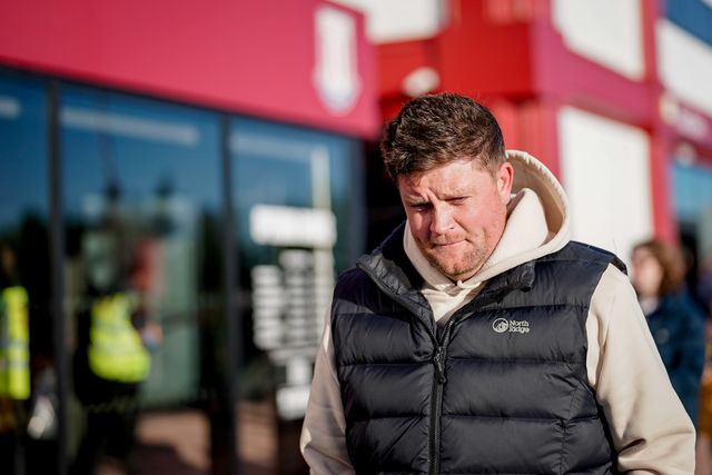 Stoke City fan walks past the club shop outside the stadium during the Sky Bet Championship match Stoke City vs Millwall at Bet365 Stadium, Stoke On Trent, United Kingdom on 21 April 2026

(Photo by Maynard Manyowa/News Images)