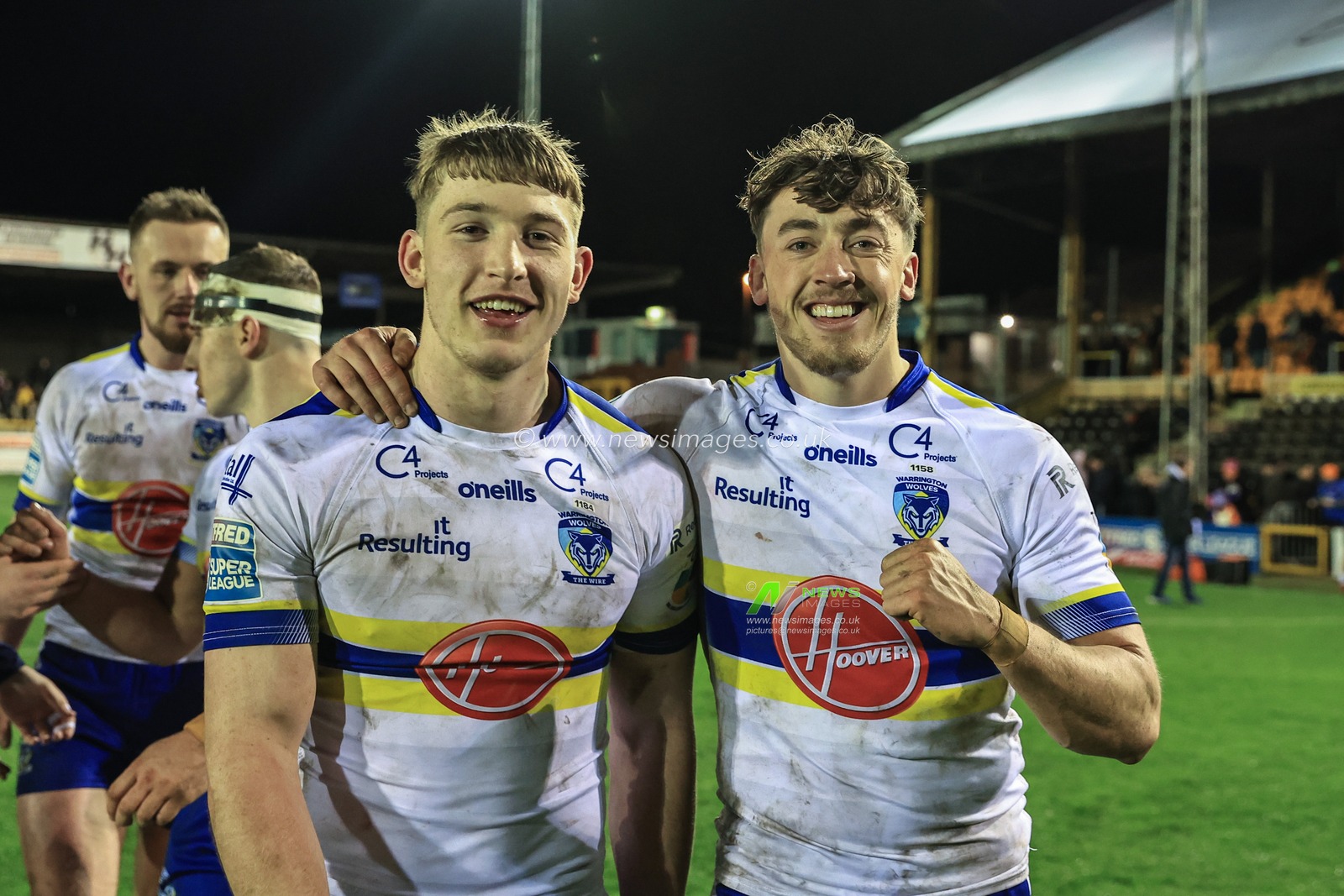 Matty Nicholson #12 of Warrington Wolves and Matty Ashton #5 of Warrington Wolves celebrate the win during the Betfred Super League Round 6 match Castleford Tigers vs Warrington Wolves at The Mend-A-Hose Jungle, Castleford, United Kingdom, 24th March 2023

(Photo by Mark Cosgrove/News Images)