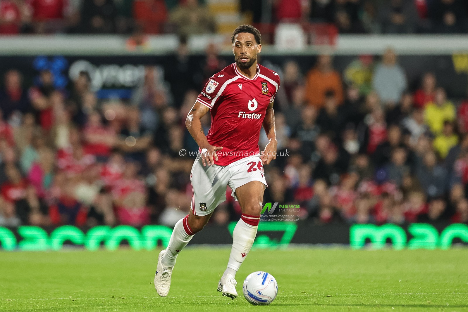 Zak Vyner of Wrexham with the ball during the Sky Bet Championship match Wrexham vs Birmingham City at The Racecourse Ground, Wrexham, United Kingdom on 28 August 2026

(Photo by Mark Cosgrove/News Images)