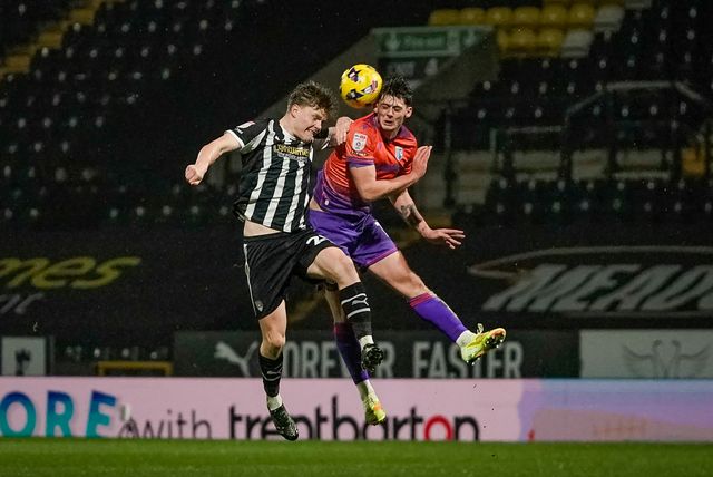 Scott Robertson of Notts County jumps up to challenge for the ball during the Sky Bet League 2 match Notts County vs Gillingham at Meadow Lane, Nottingham, United Kingdom, 3rd February 2026

(Photo by Maynard Manyowa/News Images)