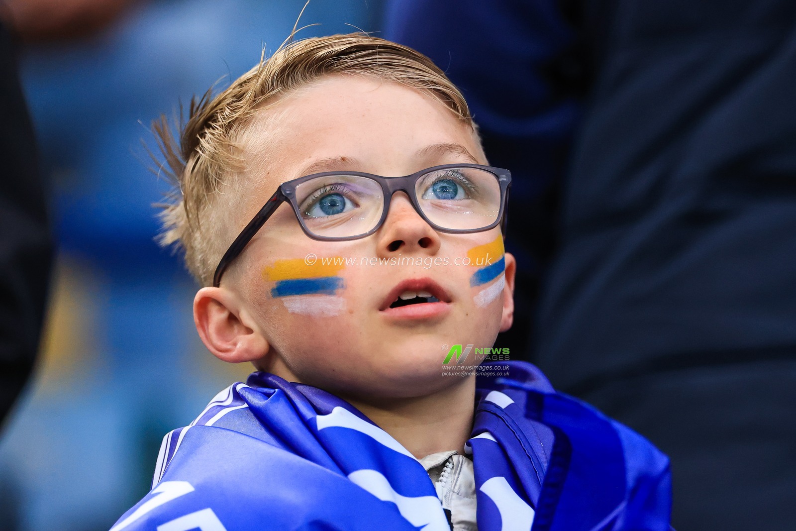 A young Leicester City fan with face paint before the game