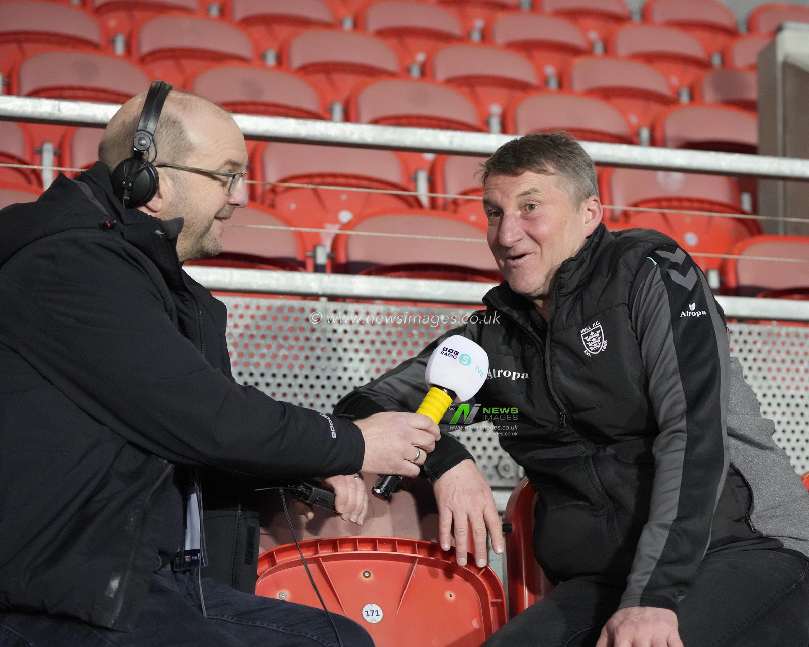 Tony Smith head coach of Hull FC gives an interview to Radio 5 Live before the Betfred Super League Round 5 match St Helens vs Hull FC at Totally Wicked Stadium, St Helens, United Kingdom, 17th March 2023

(Photo by Steve Flynn/News Images)