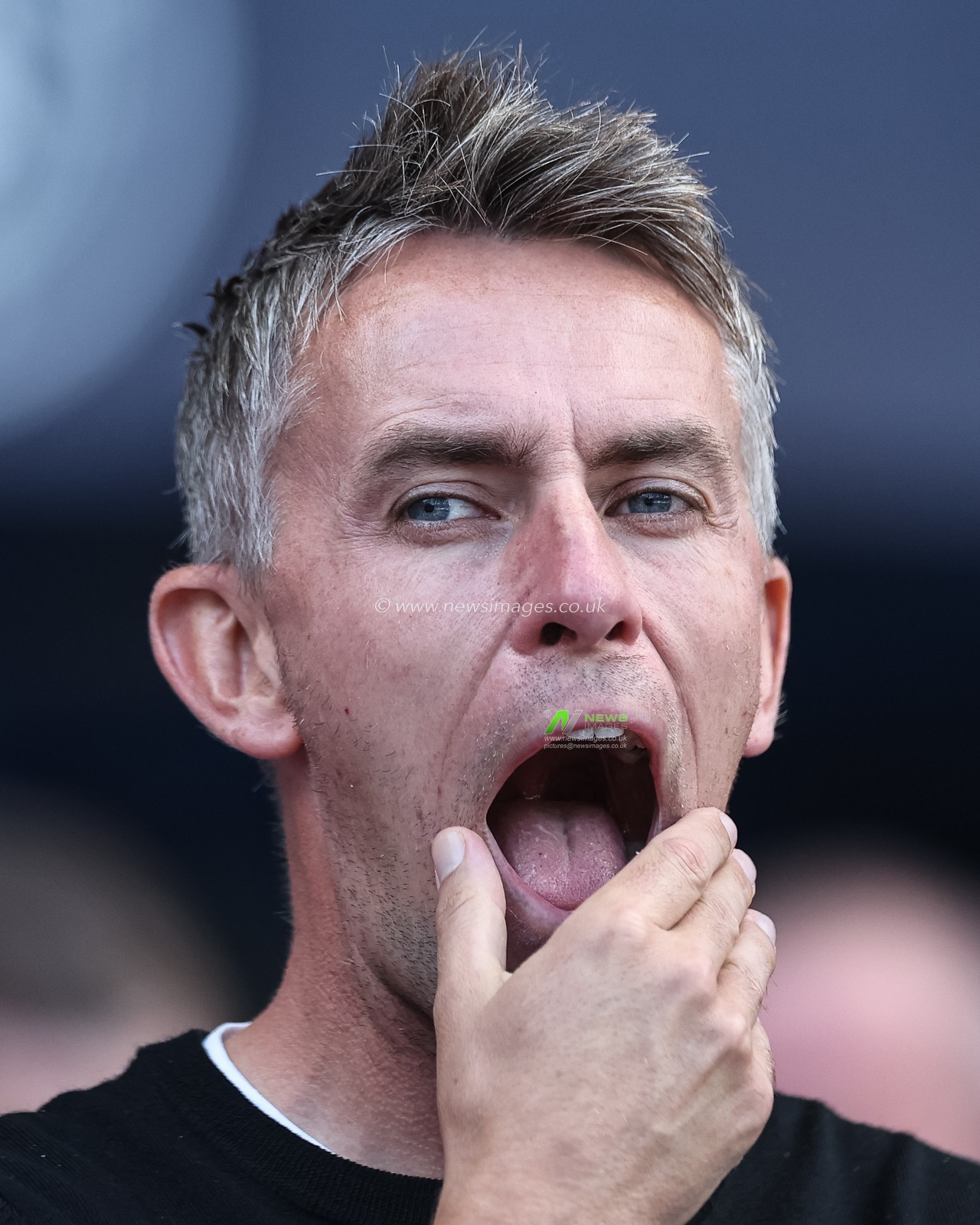 Kieran McKenna manager of Ipswich Town yawns during the Premier League match Manchester City vs Ipswich Town at Etihad Stadium, Manchester, United Kingdom, 24th August 2024

(Photo by Mark Cosgrove/News Images)