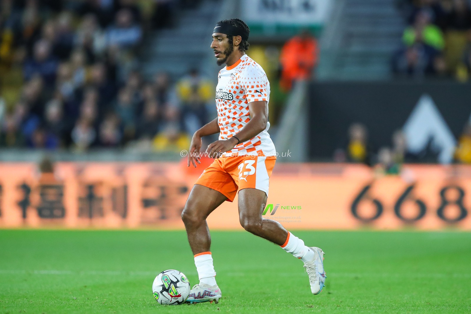 Dominic Thompson #23 of Blackpool in action during the Carabao Cup match Wolverhampton Wanderers vs Blackpool at Molineux, Wolverhampton, United Kingdom, 29th August 2023

(Photo by Gareth Evans/News Images)
