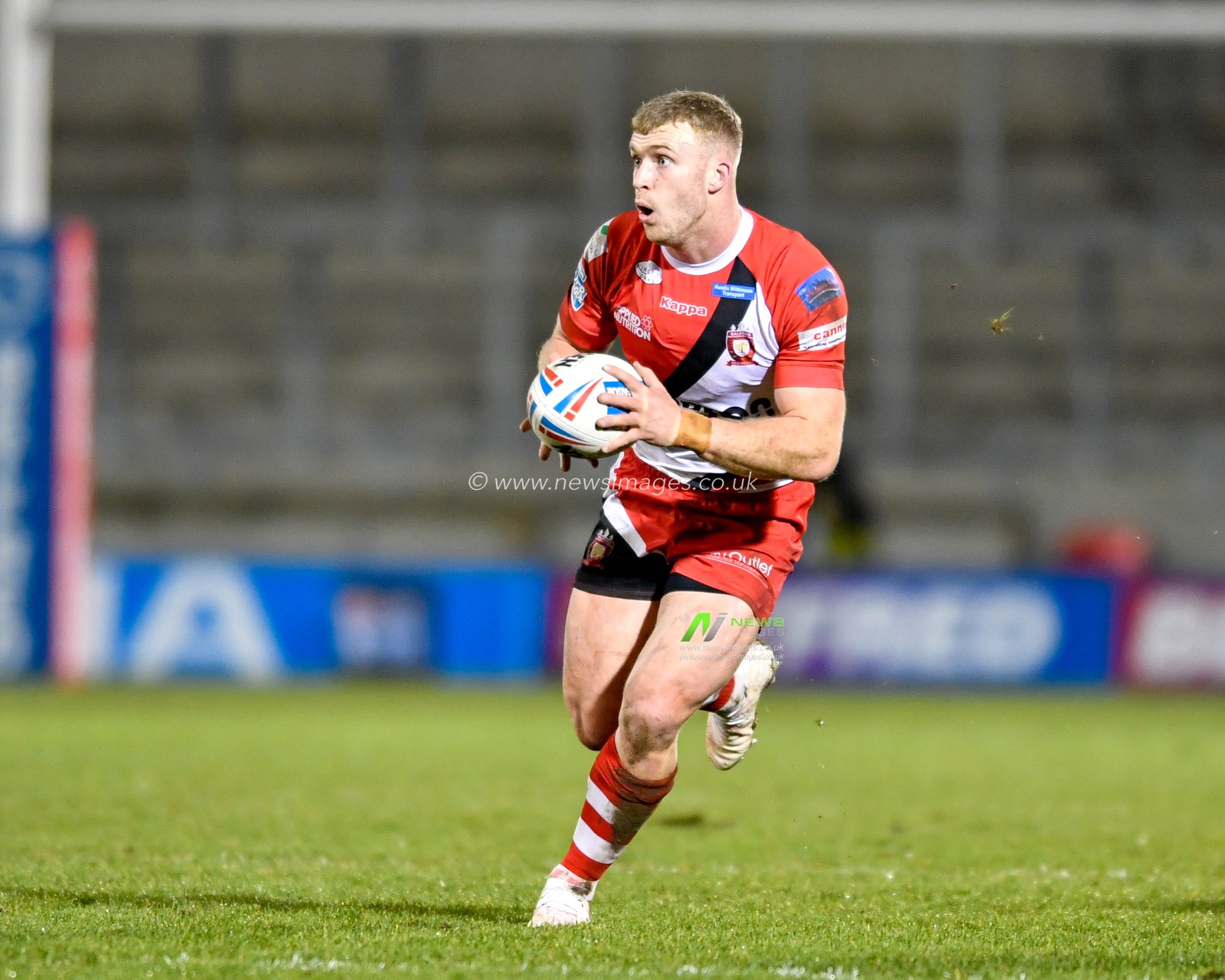 13th March 2020, AJ Bell Stadium, Eccles, England; Betfred Super League, Salford Red Devils v Wigan Warriors : Joey Lussick (9) of Salford Red Devils runs forward with the ball