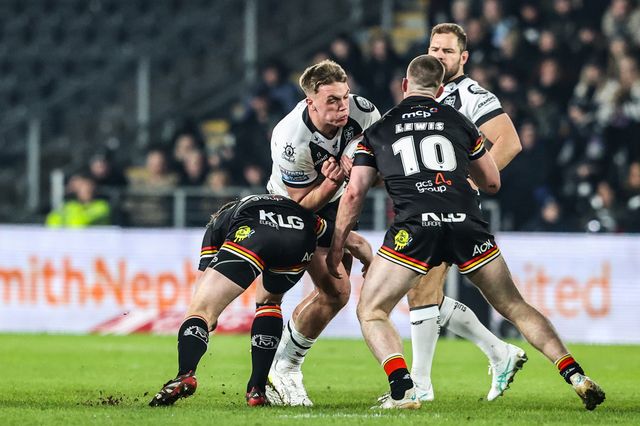 Harvie Hill of Hull FC is tackled by Loghan Lewis of Bradford Bulls during the Betfred Super League round 1 match Hull FC vs Bradford Bulls at MKM Stadium, Hull, United Kingdom on 14 February 2026

(Photo by Alfie Cosgrove/News Images)