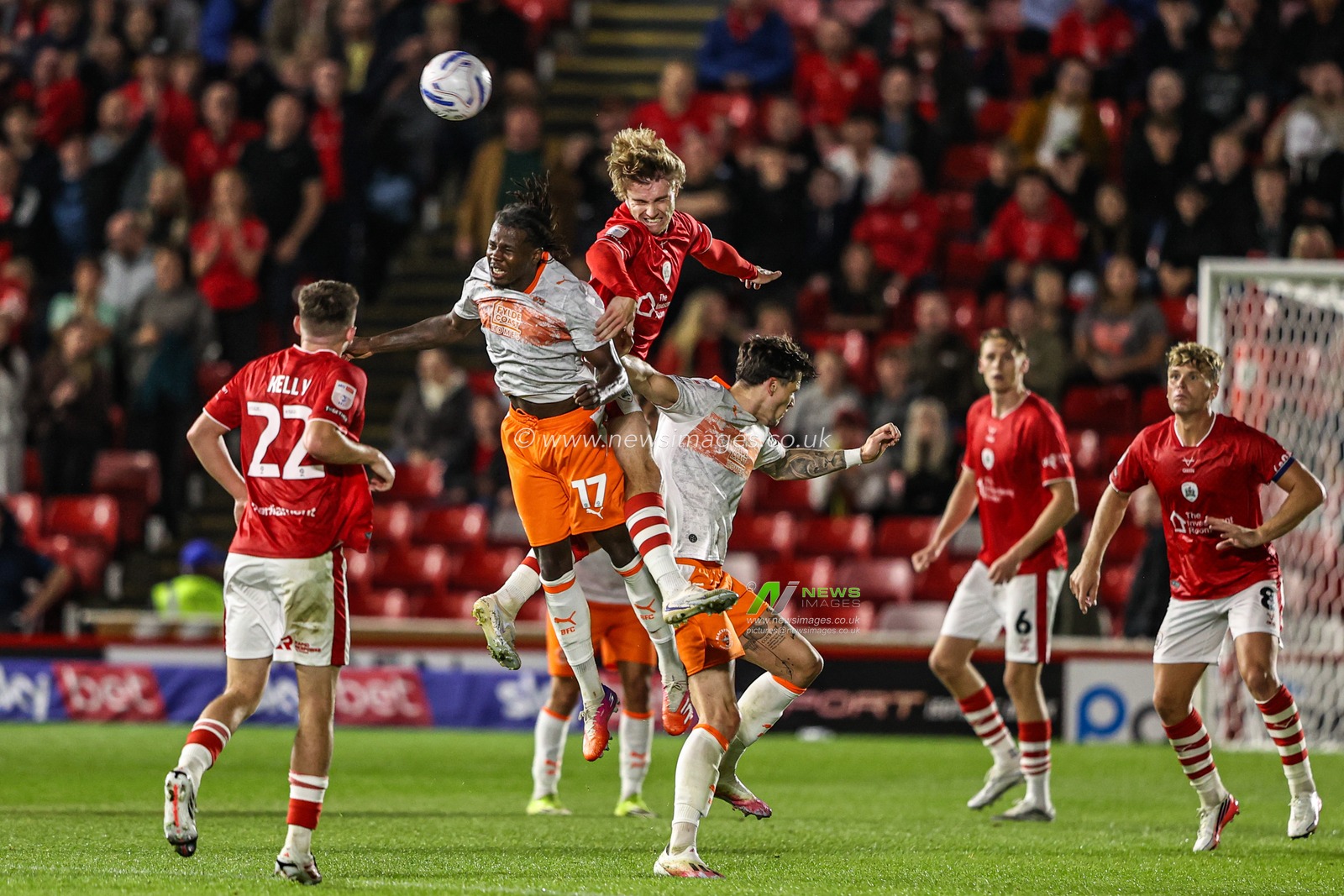 Luca Connell of Barnsley jumps up to win the high ball from Karoy Anderson of Blackpool during the Sky Bet League One match Barnsley vs Blackpool at Oakwell, Barnsley, United Kingdom on 02 September 2026

(Photo by Alfie Cosgrove/News Images)
