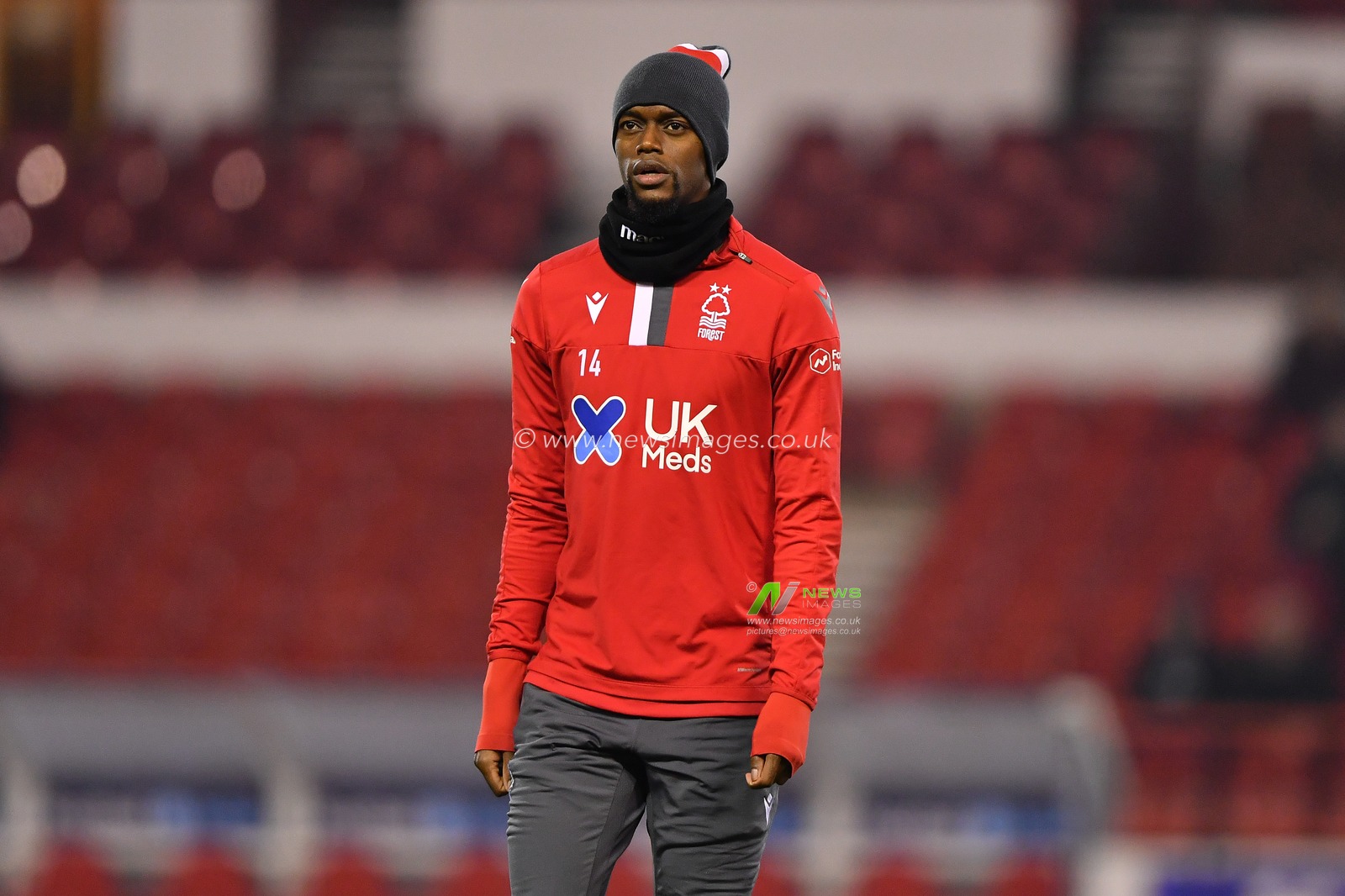 22nd January 2020, City Ground, Nottingham, England; Sky Bet Championship, Nottingham Forest v Reading : New signing Adama Diakhaby (14) of Nottingham Forest warms up with his new team-mates