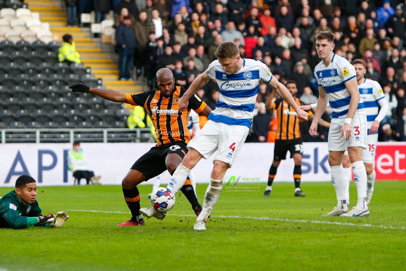 Rob Dickie #4 of QPR clears the ball away from Ã“scar EstupiÃ±Ã¡n #19 of Hull City during the Sky Bet Championship match Hull City vs Queens Park Rangers at MKM Stadium, Hull, United Kingdom, 28th January 2023

(Photo by Ben Early/News Images)