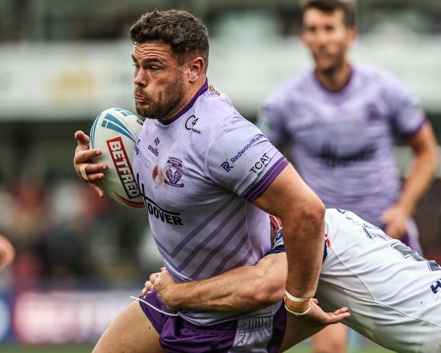 Joe Philbin of Warrington Wolves is tackled during the Betfred Super League Round 11 match Wakefield Trinity vs Warrington Wolves at DIY Kitchens Stadium, Wakefield, United Kingdom, 18th May 2025

(Photo by Alfie Cosgrove/News Images)