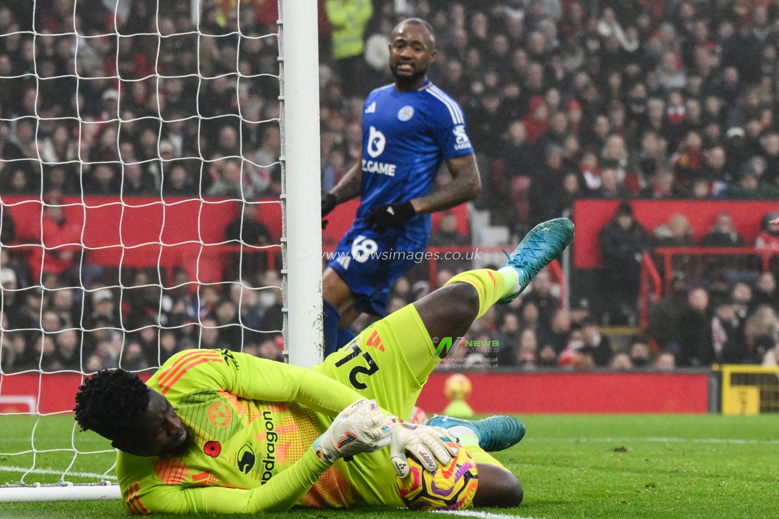 AndrÃ© Onana of Manchester United makes a save and keeps the ball in play during the Premier League match Manchester United vs Leicester City at Old Trafford, Manchester, United Kingdom, 10th November 2024

(Photo by Craig Thomas/News Images)