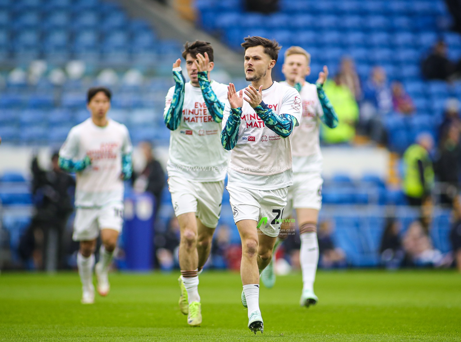Liam Cullen of Swansea City runs out for the warm-up ahead of the Sky Bet Championship match Cardiff City vs Swansea City at Cardiff City Stadium, Cardiff, United Kingdom, 18th January 2025

(Photo by Andrew Lewis/News Images)