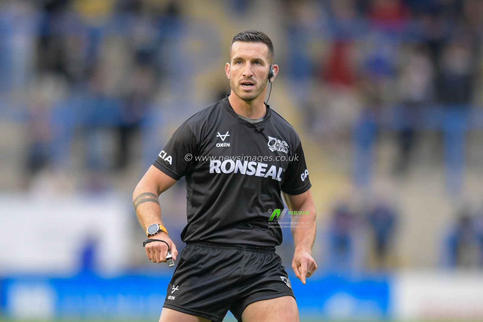 Referee Jack Smith in action during the game